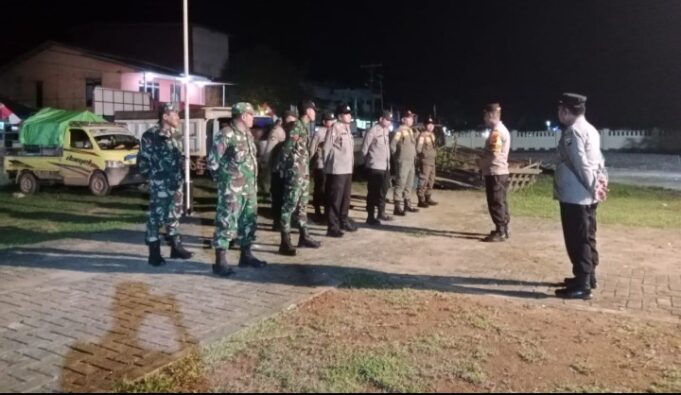 Kapolsek Jelai Hulu Pimpin Apel Gabungan dalam Rangka Cipta Kondisi Pilkades Serentak 2025